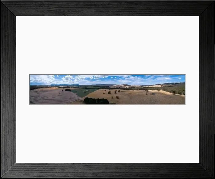 Framed Print : Wide aerial panorama fo scenic fields and hills in Victoria, Australia Framed Print : Wide aerial panorama fo scenic fields and hills in Victoria, Australia