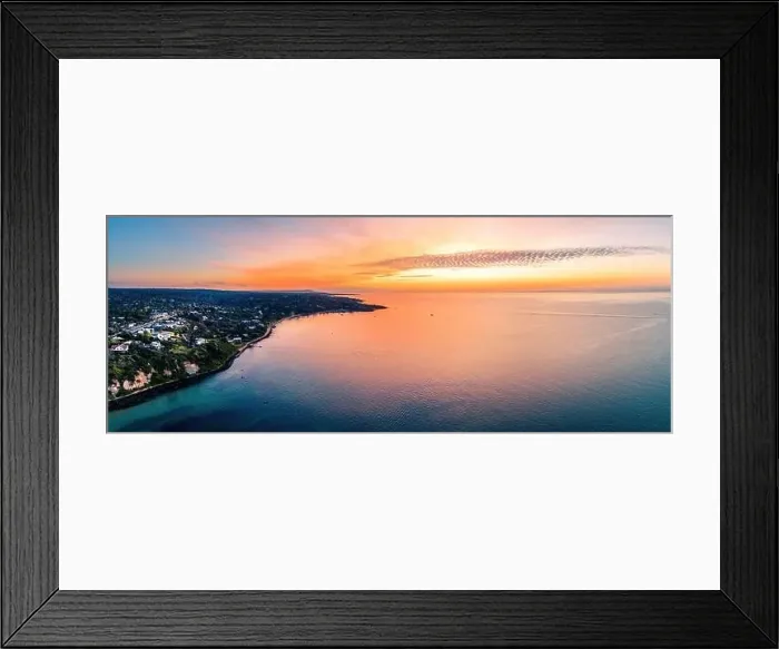 Framed Print : Wide aerial panorama of beautiful sunset glowing over calm bay waters and scenic coastline of Mornington Peninsula Framed Print : Wide aerial panorama of beautiful sunset glowing over calm bay waters and scenic coastline of Mornington Peninsula