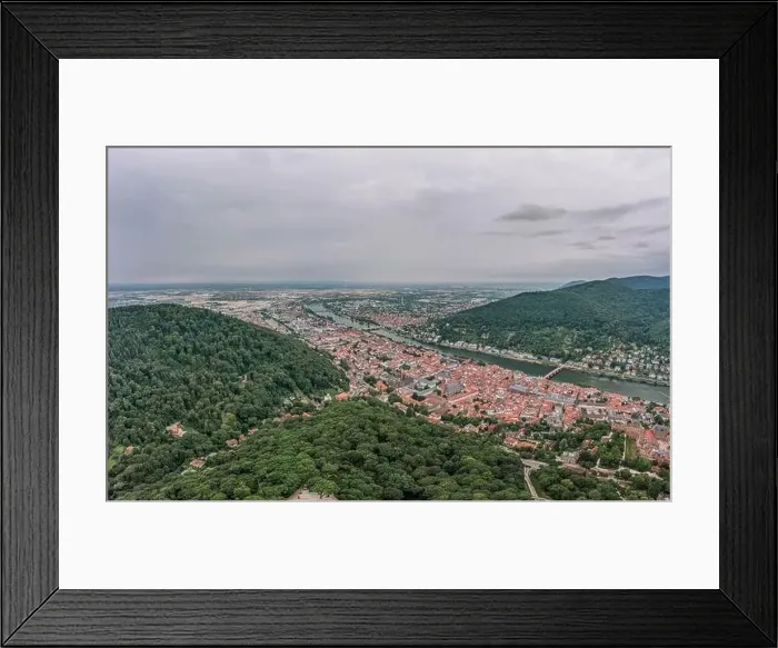 Framed Print : Aerial drone shot of Heidelberg from Konigstuhl hill in overcast summer morning Framed Print : Aerial drone shot of Heidelberg from Konigstuhl hill in overcast summer morning