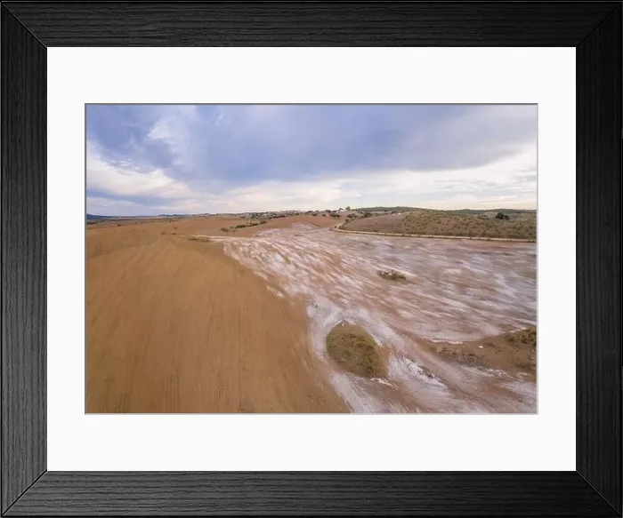 Framed Print : Drone aerial panorama of a desert like hill landscape with marble stones dust at sunset in Terena, Portugal Framed Print : Drone aerial panorama of a desert like hill landscape with marble stones dust at sunset in Terena, Portugal