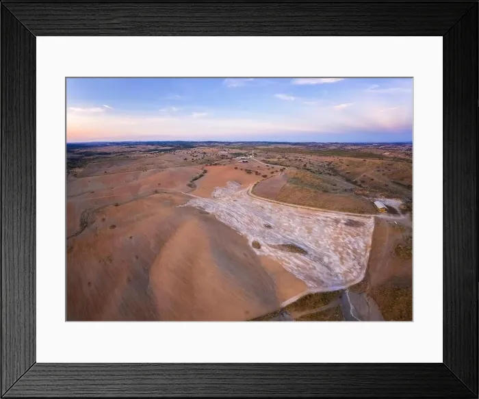 Framed Print : Drone aerial panorama of a desert like hill landscape with marble stones dust at sunset in Terena, Portugal Framed Print : Drone aerial panorama of a desert like hill landscape with marble stones dust at sunset in Terena, Portugal
