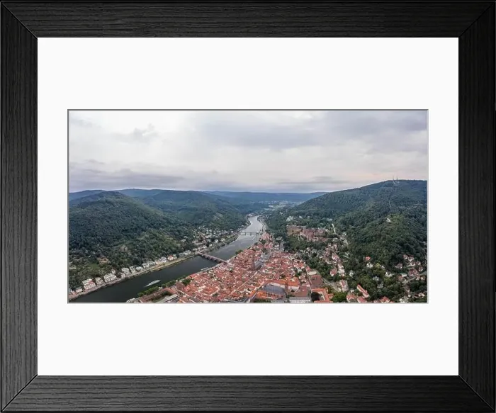 Framed Print : Panoramic aerial drone shot of Heidelberg old town in overcast at foot of Konigstuhl mountain Framed Print : Panoramic aerial drone shot of Heidelberg old town in overcast at foot of Konigstuhl mountain