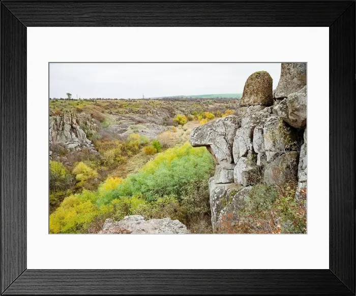 Framed Print : Aktovsky Canyon, Ukraine. Autumn trees and large stone boulders around Framed Print : Aktovsky Canyon, Ukraine. Autumn trees and large stone boulders around