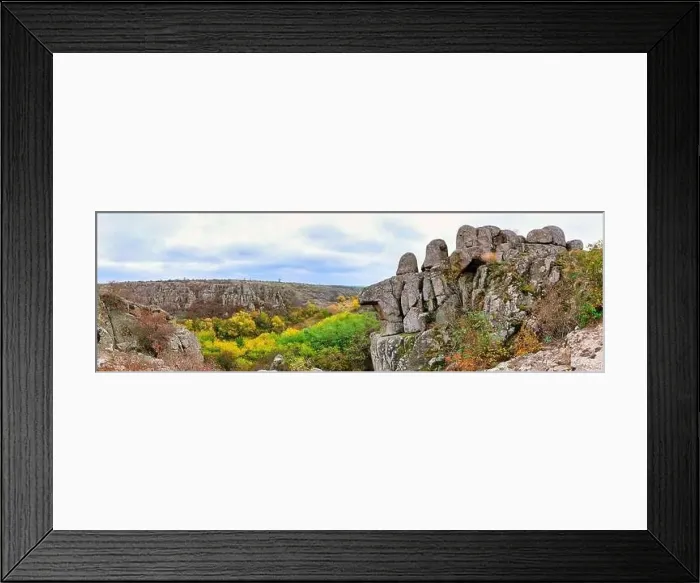 Framed Print : Aktovsky Canyon, Ukraine. Autumn trees and large stone boulders around Framed Print : Aktovsky Canyon, Ukraine. Autumn trees and large stone boulders around