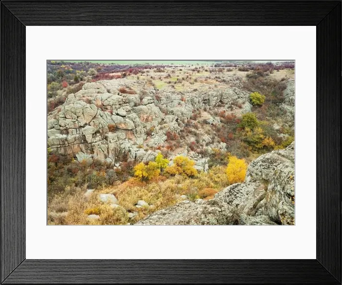 Framed Print : Aktovsky Canyon, Ukraine. Autumn trees and large stone boulders around Framed Print : Aktovsky Canyon, Ukraine. Autumn trees and large stone boulders around