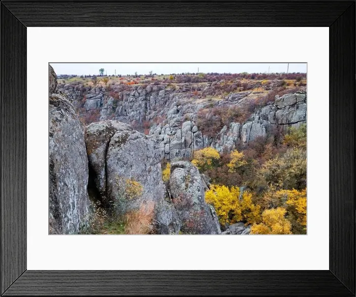 Framed Print : Aktovsky Canyon, Ukraine. Autumn trees and large stone boulders around Framed Print : Aktovsky Canyon, Ukraine. Autumn trees and large stone boulders around