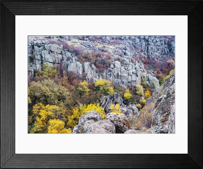 Framed Print : Aktovsky Canyon, Ukraine. Autumn trees and large stone boulders around Framed Print : Aktovsky Canyon, Ukraine. Autumn trees and large stone boulders around