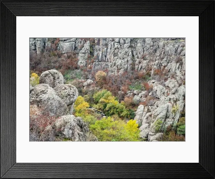 Framed Print : Aktovsky Canyon, Ukraine. Autumn trees and large stone boulders around Framed Print : Aktovsky Canyon, Ukraine. Autumn trees and large stone boulders around