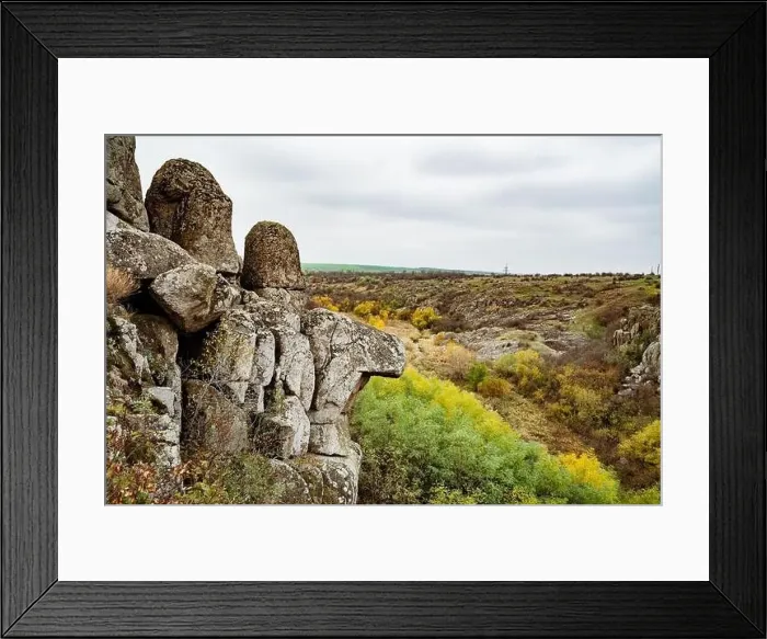 Framed Print : Aktovsky Canyon, Ukraine. Autumn trees and large stone boulders around Framed Print : Aktovsky Canyon, Ukraine. Autumn trees and large stone boulders around