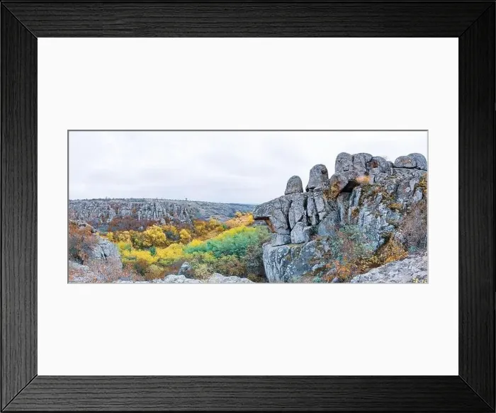 Framed Print : Aktovsky Canyon, Ukraine. Autumn trees and large stone boulders around Framed Print : Aktovsky Canyon, Ukraine. Autumn trees and large stone boulders around