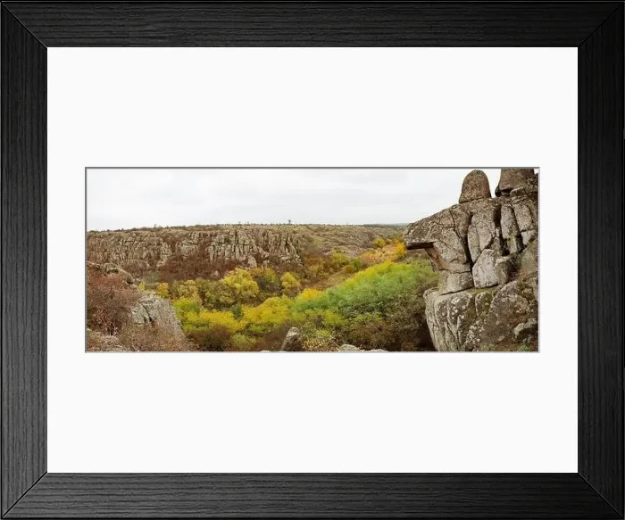 Framed Print : Aktovsky Canyon, Ukraine. Autumn trees and large stone boulders around Framed Print : Aktovsky Canyon, Ukraine. Autumn trees and large stone boulders around