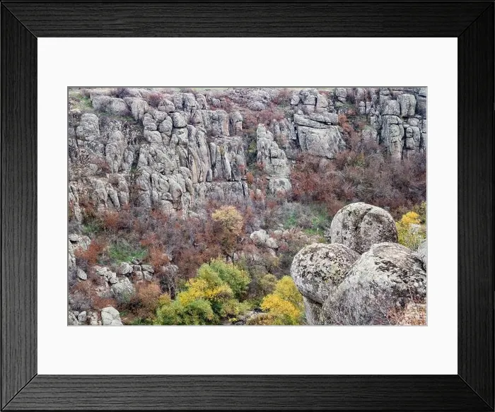 Framed Print : Aktovsky Canyon, Ukraine. Autumn trees and large stone boulders around Framed Print : Aktovsky Canyon, Ukraine. Autumn trees and large stone boulders around