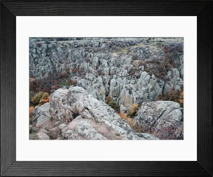 Framed Print : Aktovsky Canyon, Ukraine. Autumn trees and large stone boulders around Framed Print : Aktovsky Canyon, Ukraine. Autumn trees and large stone boulders around