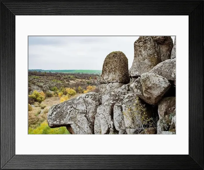 Framed Print : Aktovsky Canyon, Ukraine. Autumn trees and large stone boulders around Framed Print : Aktovsky Canyon, Ukraine. Autumn trees and large stone boulders around
