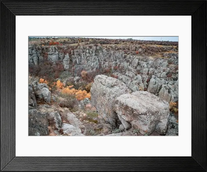Framed Print : Aktovsky Canyon, Ukraine. Autumn trees and large stone boulders around Framed Print : Aktovsky Canyon, Ukraine. Autumn trees and large stone boulders around