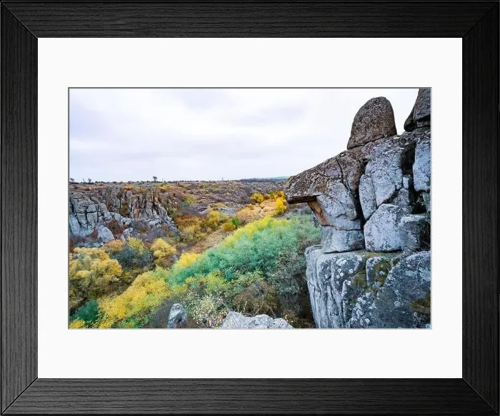 Framed Print : Aktovsky Canyon, Ukraine. Autumn trees and large stone boulders around Framed Print : Aktovsky Canyon, Ukraine. Autumn trees and large stone boulders around