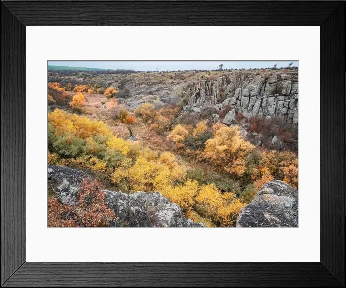 Framed Print : Aktovsky Canyon, Ukraine. Autumn trees and large stone boulders around Framed Print : Aktovsky Canyon, Ukraine. Autumn trees and large stone boulders around