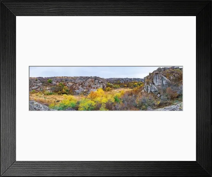 Framed Print : Aktovsky Canyon, Ukraine. Autumn trees and large stone boulders around Framed Print : Aktovsky Canyon, Ukraine. Autumn trees and large stone boulders around