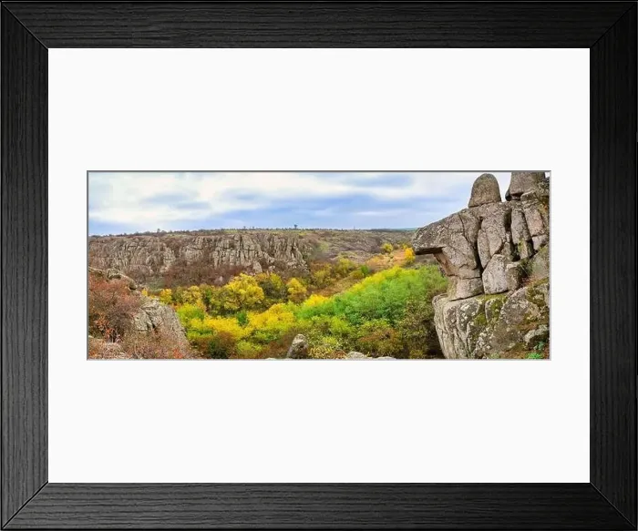 Framed Print : Aktovsky Canyon, Ukraine. Autumn trees and large stone boulders around Framed Print : Aktovsky Canyon, Ukraine. Autumn trees and large stone boulders around