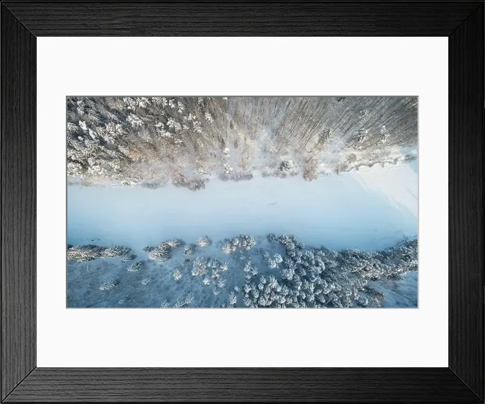 Framed Print : Cold winter background theme. Frozen river above drone view Framed Print : Cold winter background theme. Frozen river above drone view
