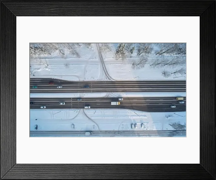 Framed Print : Asphalt frozen road aerial drone top view. Highway road Framed Print : Asphalt frozen road aerial drone top view. Highway road
