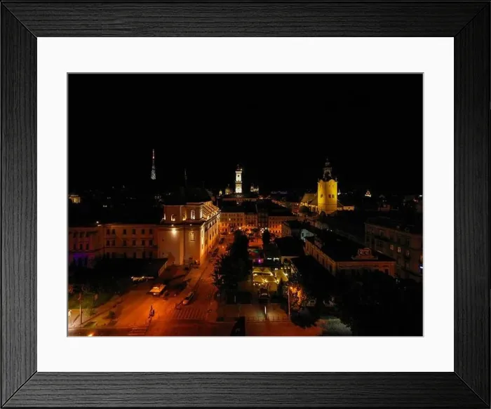 Framed Print : Lviv, Ukraine - August, 2020: View on Lviv city hall at night from drone Framed Print : Lviv, Ukraine - August, 2020: View on Lviv city hall at night from drone