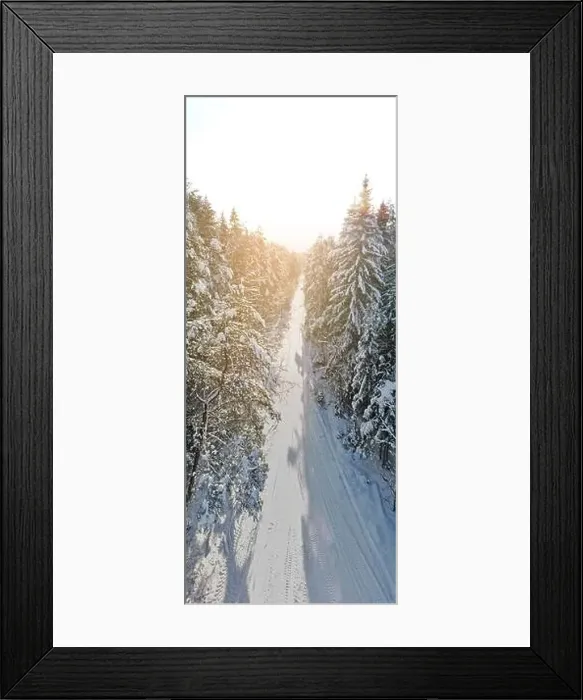 Framed Print : photo from a flying drone, a small planet and a winter landscape, pines and spruces are covered with snow Framed Print : photo from a flying drone, a small planet and a winter landscape, pines and spruces are covered with snow