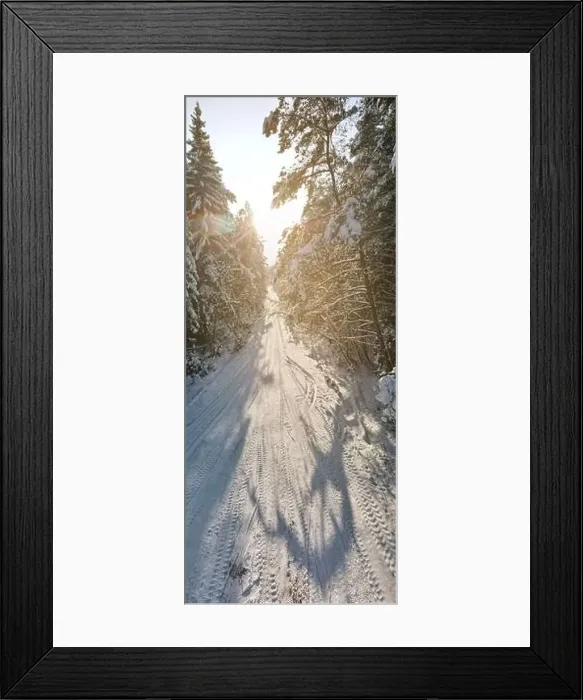 Framed Print : photo from a flying drone, a small planet and a winter landscape, pines and spruces are covered with snow Framed Print : photo from a flying drone, a small planet and a winter landscape, pines and spruces are covered with snow