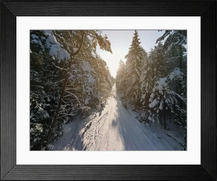 Framed Print : photo from a flying drone, a small planet and a winter landscape, pines and spruces are covered with snow Framed Print : photo from a flying drone, a small planet and a winter landscape, pines and spruces are covered with snow