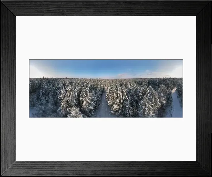 Framed Print : photo from a flying drone, a small planet and a winter landscape, pines and spruces are covered with snow Framed Print : photo from a flying drone, a small planet and a winter landscape, pines and spruces are covered with snow