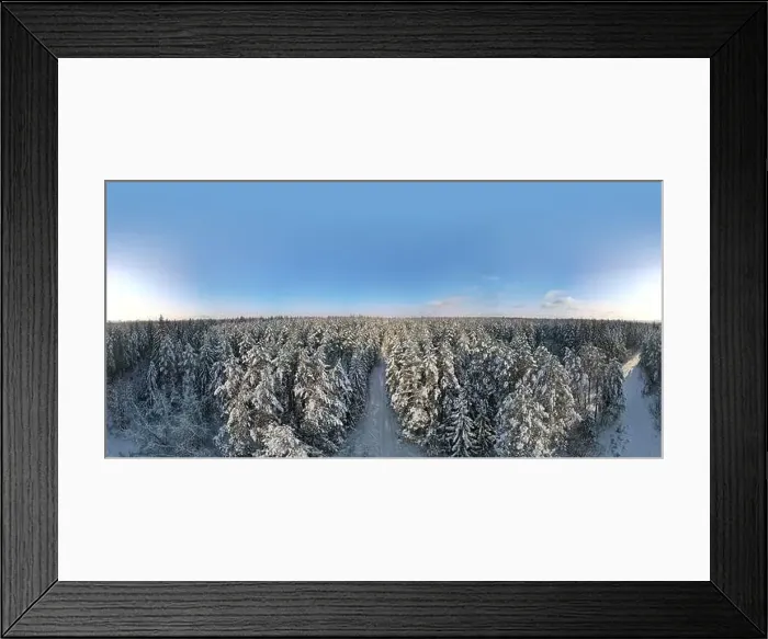 Framed Print : photo from a flying drone, a small planet and a winter landscape, pines and spruces are covered with snow Framed Print : photo from a flying drone, a small planet and a winter landscape, pines and spruces are covered with snow