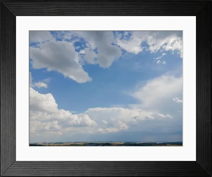 Framed Print : View from drone, panorama blue sky and white clouds, sun at sunset Framed Print : View from drone, panorama blue sky and white clouds, sun at sunset
