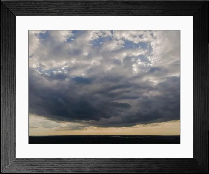 Framed Print : View from drone, panorama orange sky and gray clouds, sun at sunset Framed Print : View from drone, panorama orange sky and gray clouds, sun at sunset