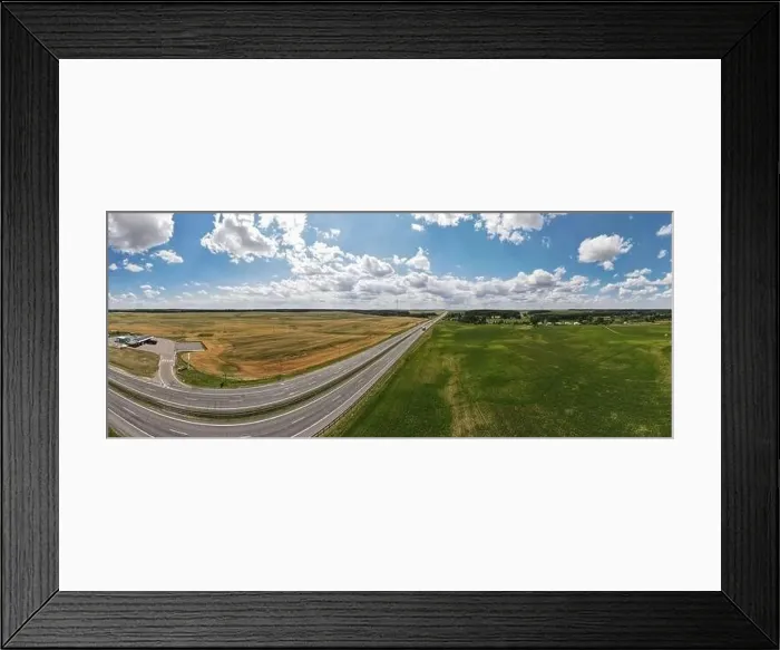 Framed Print : Photo from a flying drone, highway road on a sunny day in summer Framed Print : Photo from a flying drone, highway road on a sunny day in summer