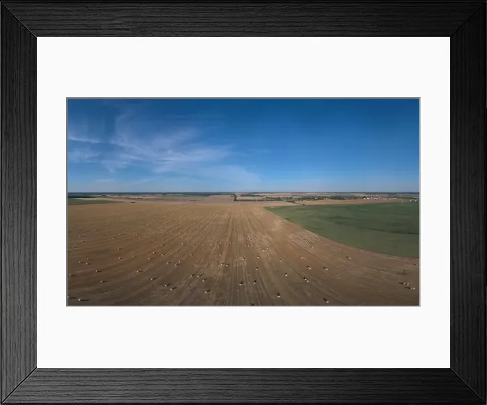 Framed Print : Landscape view from drone, yellow and green fields and haystacks