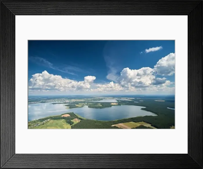Framed Print : Bright lake landscape with blue sky and clouds aerial drone view Framed Print : Bright lake landscape with blue sky and clouds aerial drone view