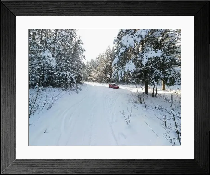 Framed Print : Winter landscape, snowy forest and little red car Framed Print : Winter landscape, snowy forest and little red car