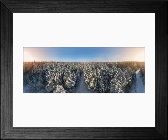 Framed Print : photo from a flying drone, a small planet and a winter landscape, pines and spruces are covered with snow Framed Print : photo from a flying drone, a small planet and a winter landscape, pines and spruces are covered with snow