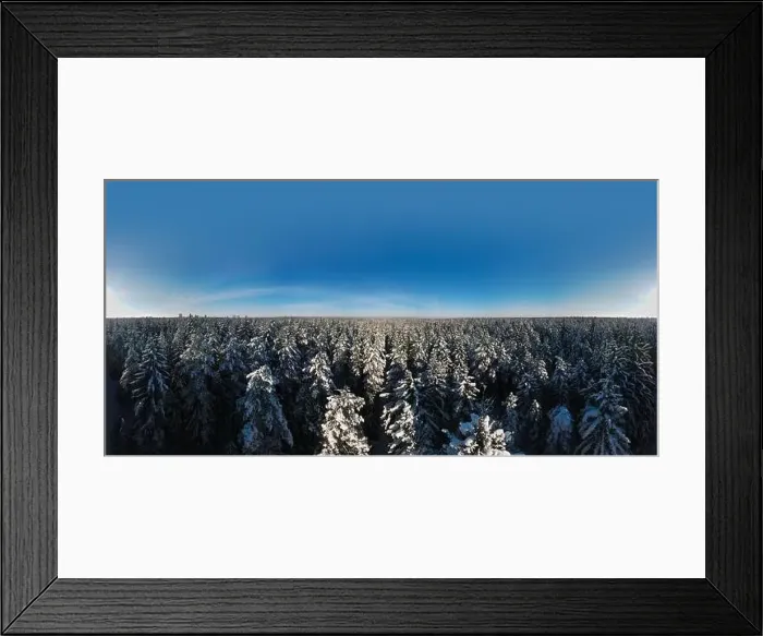 Framed Print : photo from a flying drone, a small planet and a winter landscape, pines and spruces are covered with snow Framed Print : photo from a flying drone, a small planet and a winter landscape, pines and spruces are covered with snow