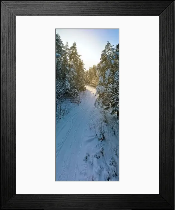 Framed Print : photo from a flying drone, a small planet and a winter landscape, pines and spruces are covered with snow Framed Print : photo from a flying drone, a small planet and a winter landscape, pines and spruces are covered with snow