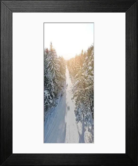 Framed Print : photo from a flying drone, a small planet and a winter landscape, pines and spruces are covered with snow Framed Print : photo from a flying drone, a small planet and a winter landscape, pines and spruces are covered with snow