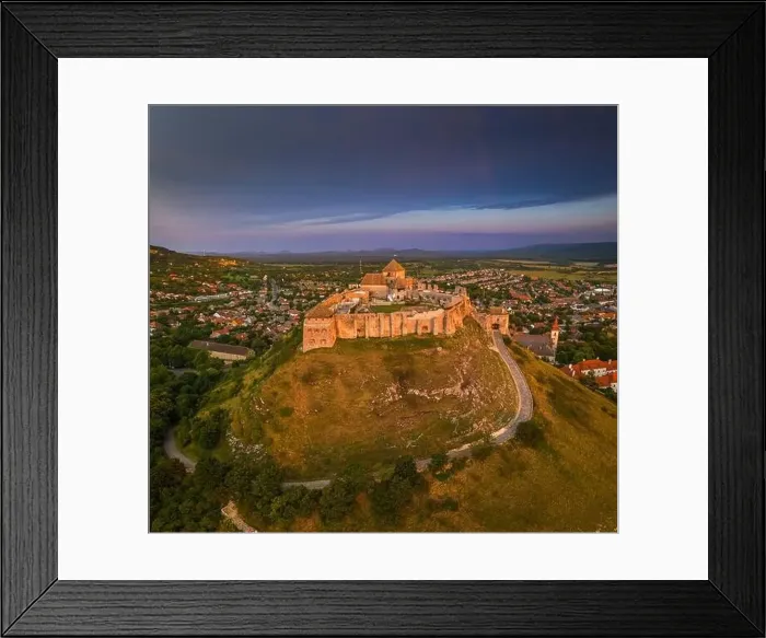 Framed Print : Sumeg, Hungary - Aerial panoramic view of the famous High Castle of Sumeg in Veszprem county at sunset with storm Framed Print : Sumeg, Hungary - Aerial panoramic view of the famous High Castle of Sumeg in Veszprem county at sunset with storm