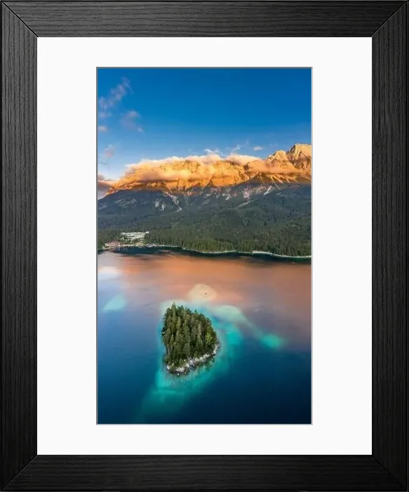 Framed Print : Aerial drone shot of Alpenglow with fog on Zugspitze by Eibsee lake in Germany Framed Print : Aerial drone shot of Alpenglow with fog on Zugspitze by Eibsee lake in Germany