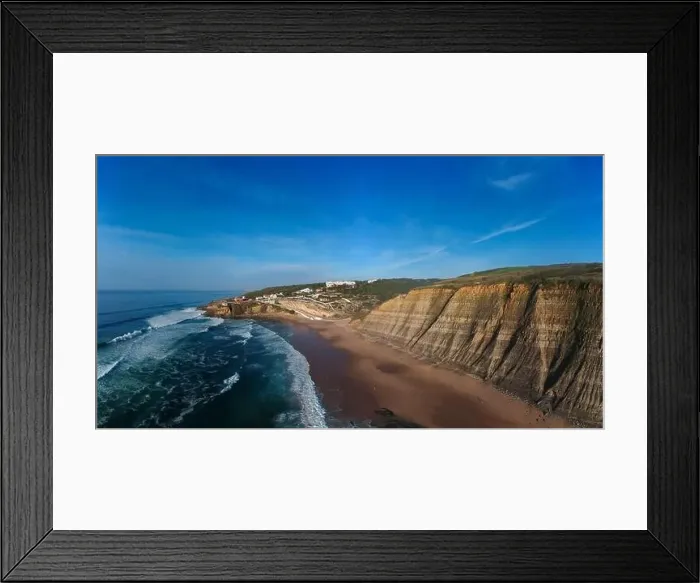 Framed Print : Aerial view of waves on a beautiful sandy ocean beach and cliff. Panorama atlantic coastline Framed Print : Aerial view of waves on a beautiful sandy ocean beach and cliff. Panorama atlantic coastline