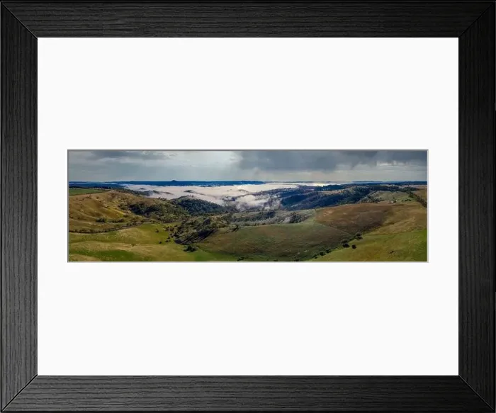 Framed Print : Aerial view of low-level clouds in a large green valley in the Central Tablelands in regional New South Wales Australia Framed Print : Aerial view of low-level clouds in a large green valley in the Central Tablelands in regional New South Wales Australia
