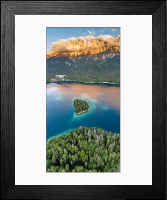 Framed Print : Aerial drone shot of Alpenglow with fog on Zugspitze by Eibsee lake in Germany Framed Print : Aerial drone shot of Alpenglow with fog on Zugspitze by Eibsee lake in Germany