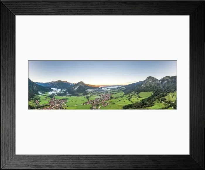 Framed Print : Panoramic view of village Bad Oberdorf at Germany Austria border at sunset