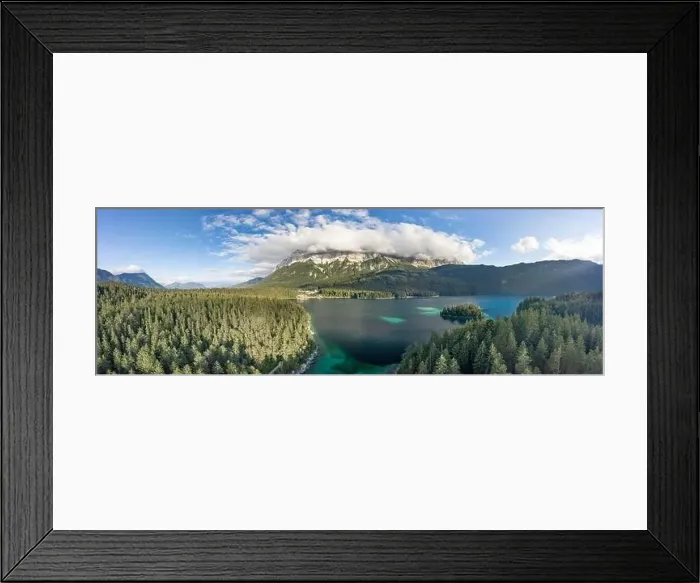 Framed Print : Panoramic aerial view of Zugspitze mountain heavy fog by Eibsee Lake in Germany Framed Print : Panoramic aerial view of Zugspitze mountain heavy fog by Eibsee Lake in Germany