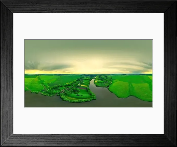 Framed Print : Colorful panorama from a copter over a wide river, fields, meadows. Beautiful panorama at sunset in summer Framed Print : Colorful panorama from a copter over a wide river, fields, meadows. Beautiful panorama at sunset in summer