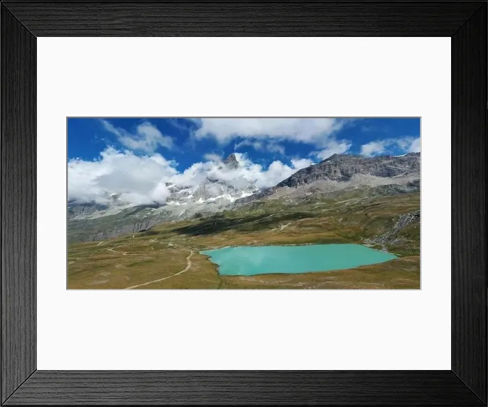 Framed Print : Aerial view of mount Cervino (Matterhorn) and Tramail de Vieille lake from the fields of Plan Maison Framed Print : Aerial view of mount Cervino (Matterhorn) and Tramail de Vieille lake from the fields of Plan Maison